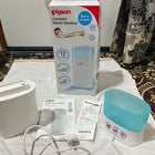 PIGEON Compact Steam Steriliser/Sterilizer for baby bottles and feeding accessories, featuring an efficient steam sterilization system, compact space-saving design, and convenient everyday use for maintaining feeding hygiene.