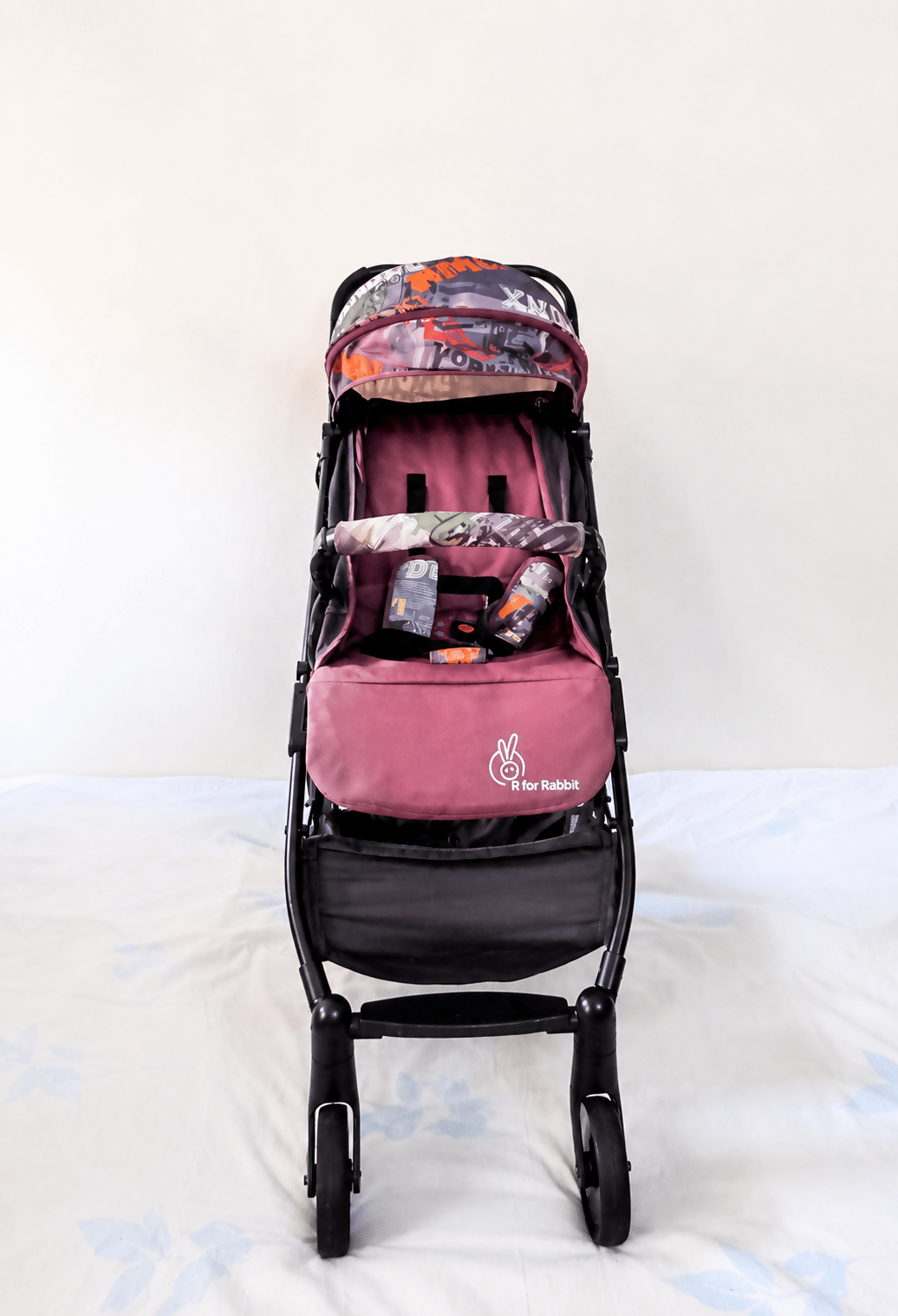 R for Rabbit Pocket Lite baby stroller with lightweight foldable design, reclining seat, adjustable canopy, 5-point safety harness, smooth wheels, and compact travel-friendly frame for babies and toddlers up to 15 kg.