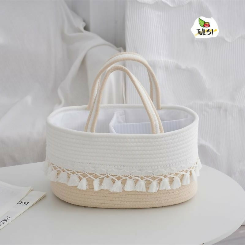 Baby diaper caddy bag with multiple storage compartments, cute design, organized sections, sturdy handles, and convenient storage for diapers, wipes, bottles, and baby essentials.