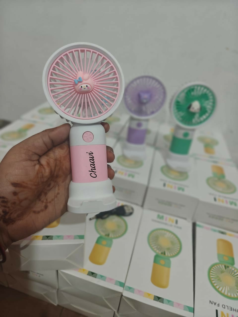 Personalized portable fan with stand and mobile holder featuring compact design, custom personalization, adjustable support, hands-free convenience, and cooling comfort for everyday use.