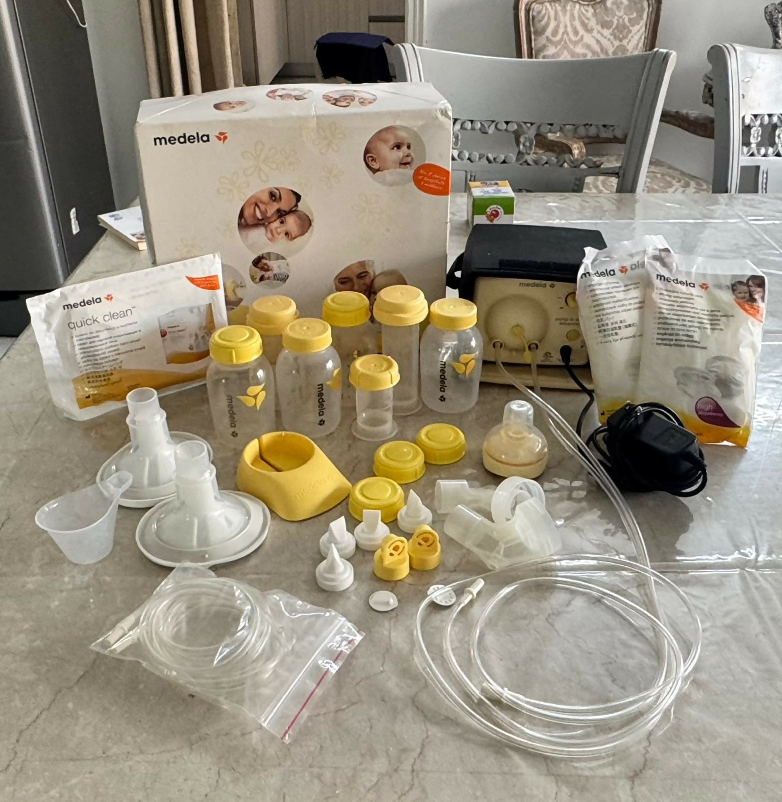 Medela Pump In Style Advance breast pump with efficient electric milk expression, adjustable suction levels, soft breast shields, and a portable design for comfortable breastfeeding support.
