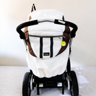Emmaljunga City Cross Premium Stroller B128 in Almost New condition, available in Chennai, Tamil Nadu, featuring a reversible seat, comfortable reclining design, protective canopy, rain cover, sturdy frame, and smooth wheels.