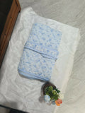Premium hooded baby blanket made from ultra-soft fabric with an attached hood for extra warmth and comfort, perfect for newborns, infants, bath time, naps, and everyday cuddles.