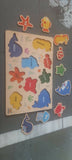 Wooden puzzle for kids with colorful pieces, smooth child-safe edges, and an engaging educational design that encourages problem-solving, hand-eye coordination, shape recognition, and fine motor skill development.