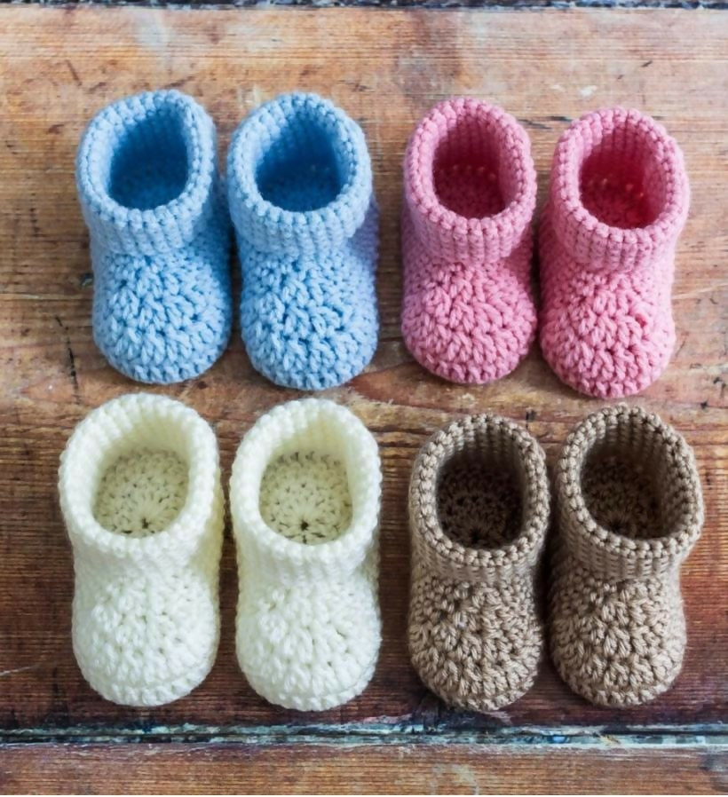 Soft and comfortable booties set for babies, perfect for warmth and style, made with baby-safe materials for everyday wear.