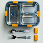 Stainless steel lunch box with compartments, spoon, and fork 