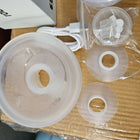 ROBOSON wearable breast pump with hands-free design, compact milk collection cups, adjustable suction settings, and portable pumping support for breastfeeding mothers.