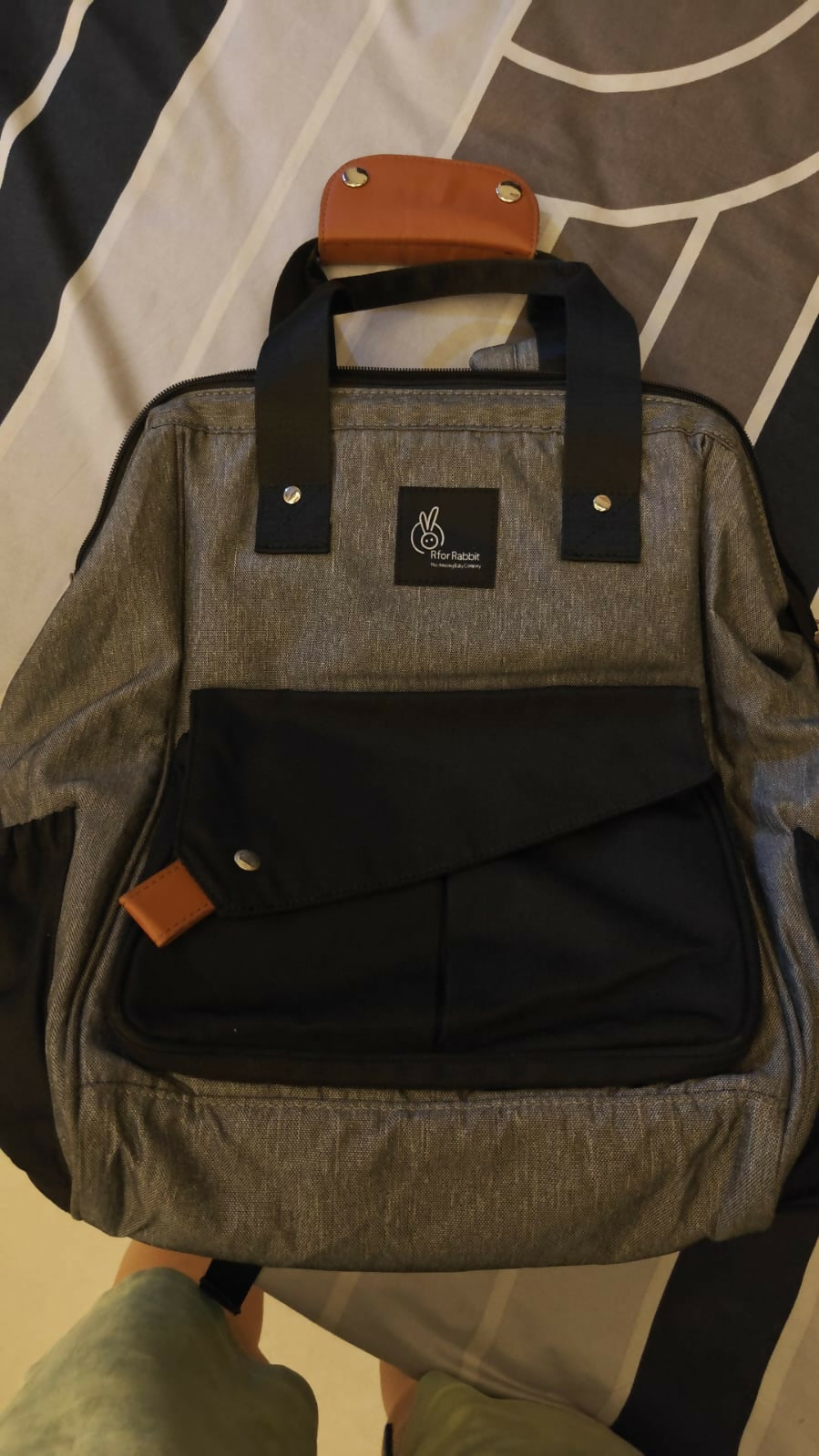 R for Rabbit Caramello Delight diaper bag for moms with multiple storage compartments, spacious design, comfortable carrying straps, and organized space for baby essentials.