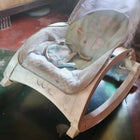
R for Rabbit rocker/bouncer with a cushioned seat, gentle bouncing and rocking motion, secure safety harness, and sturdy frame for soothing, relaxing, and entertaining newborns and infants.