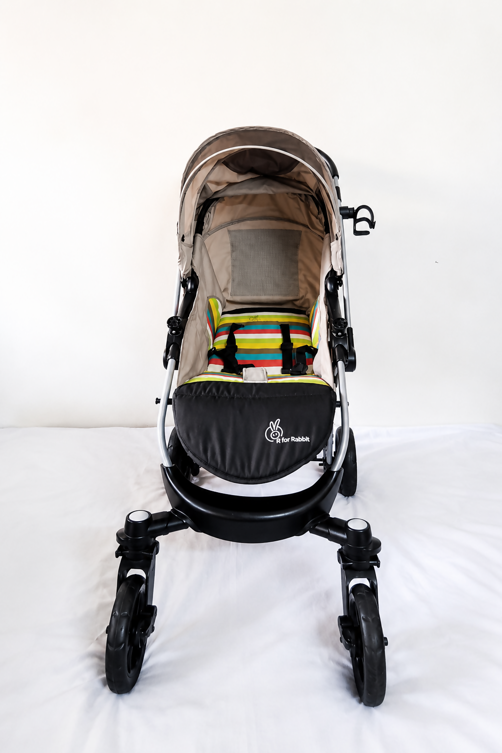 R for Rabbit Chocolate Ride Baby Stroller Pram B122 in Rainbow design with reversible handle, comfortable reclining seat, safety harness, protective canopy, smooth wheels, and foldable frame for everyday baby travel.