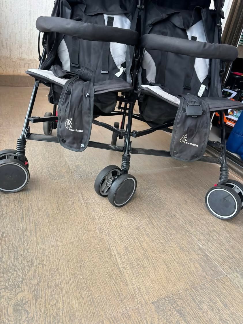 R FOR RABBIT Ginny & Johnny Stroller/Pram with a lightweight foldable frame, reclining seat, adjustable canopy, 5-point safety harness, smooth wheels, and storage basket for safe and comfortable travel with babies and toddlers.