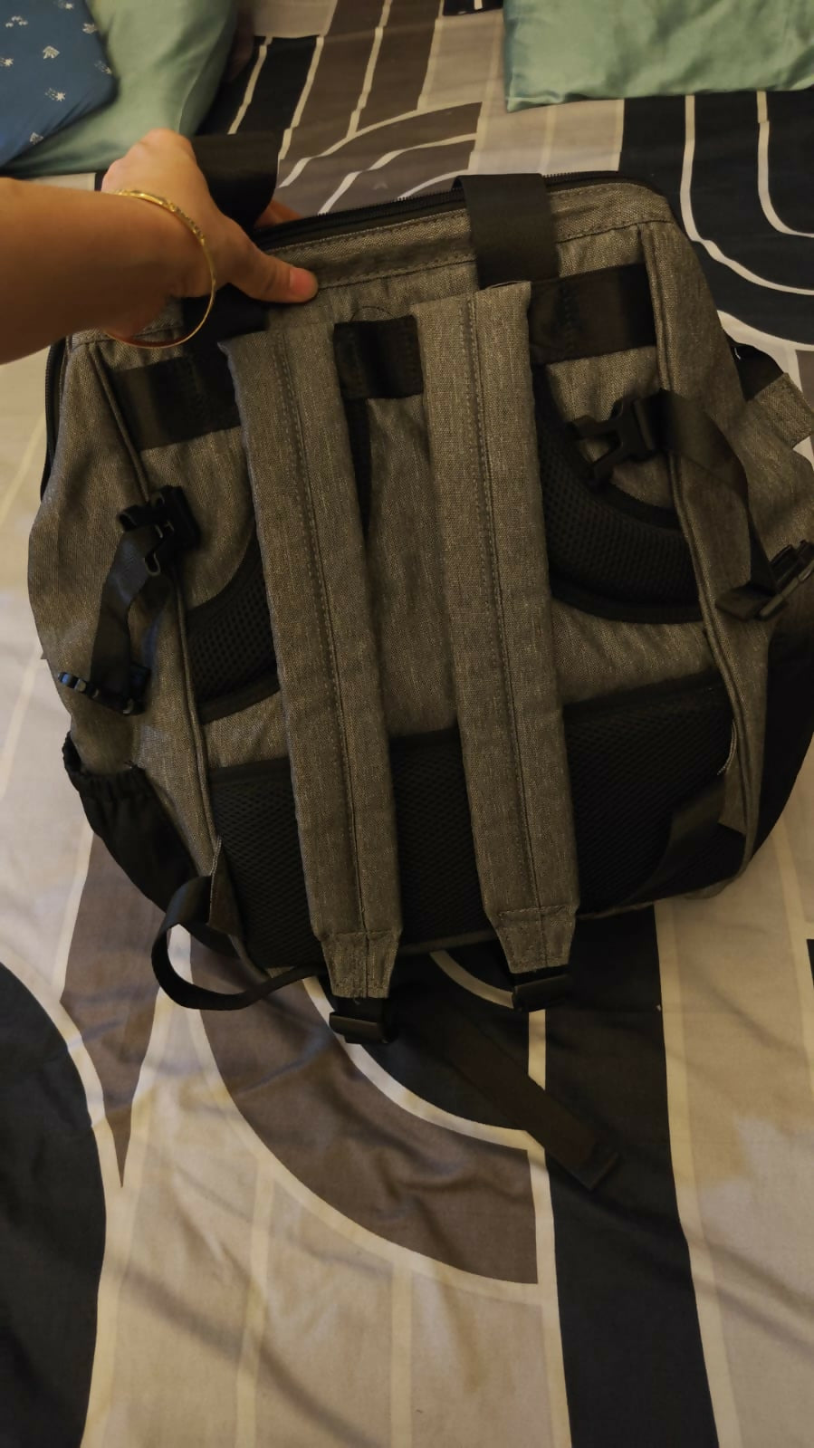 R for Rabbit Caramello Delight diaper bag for moms with multiple storage compartments, spacious design, comfortable carrying straps, and organized space for baby essentials.