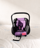 LuvLap infant car seat baby carrier with rear-facing design, carry cot function, 5-point safety harness, ergonomic carry handle, cushioned seating, and side-impact protection for newborns and infants up to 13 kg.