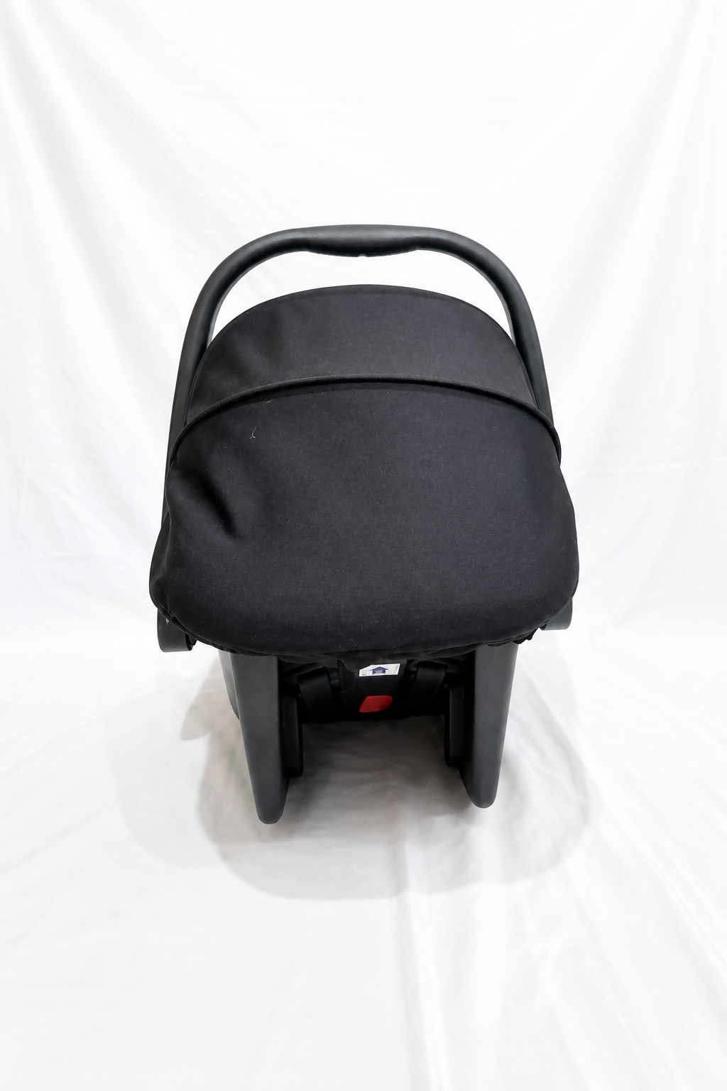 R for Rabbit Picaboo infant car seat carrier with rear-facing design, cushioned newborn support, secure safety harness, carry handle, and comfortable travel protection for babies.