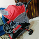 Chicco Cortina Baby Stroller with comfortable reclining seat, protective canopy, safety harness, smooth wheels, foldable frame, and spacious storage basket for convenient everyday outings with babies and toddlers.