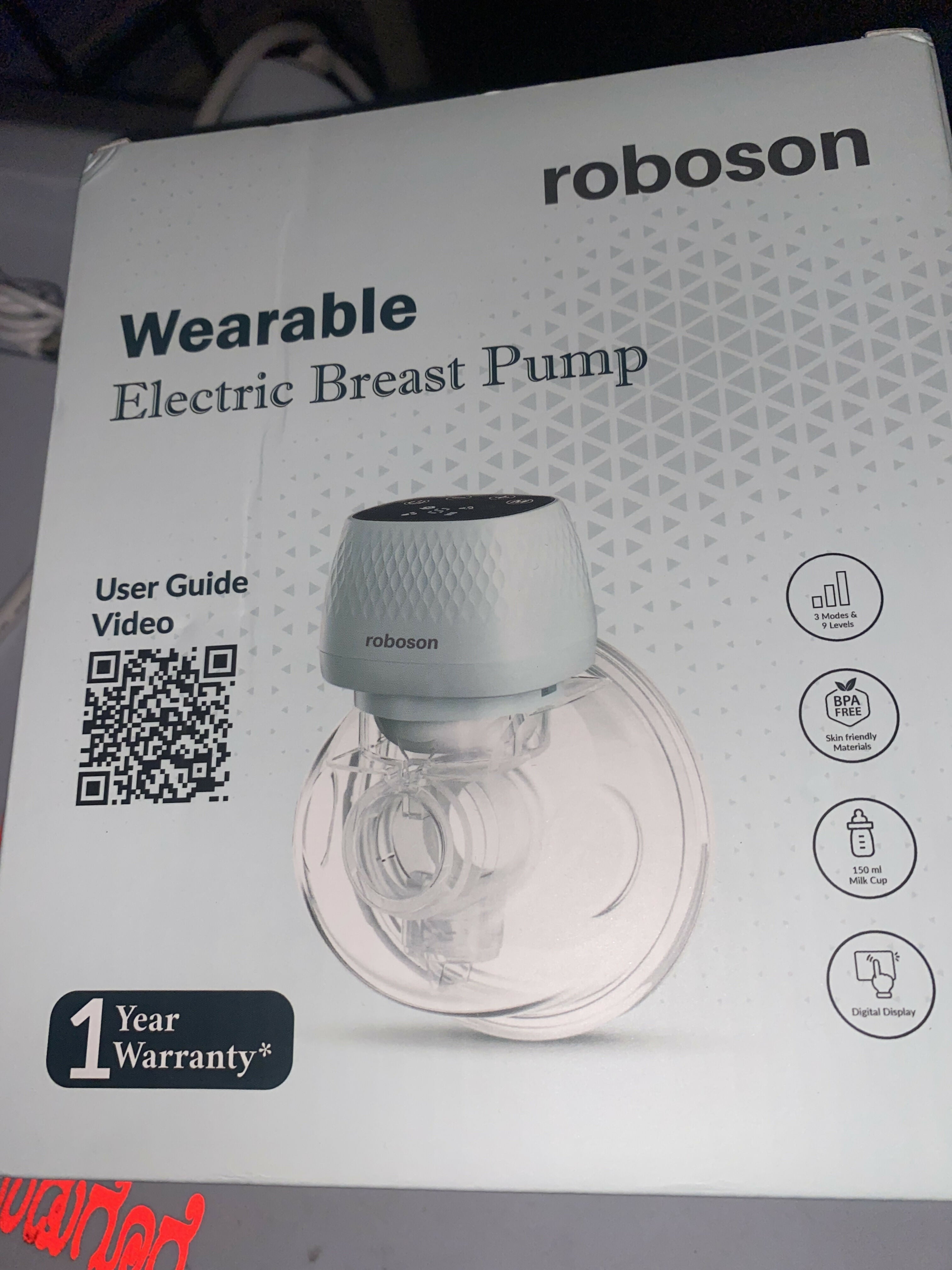 Roboson electric breast pump with adjustable suction, compact design, milk collection bottle, and comfortable pumping support for breastfeeding mothers.