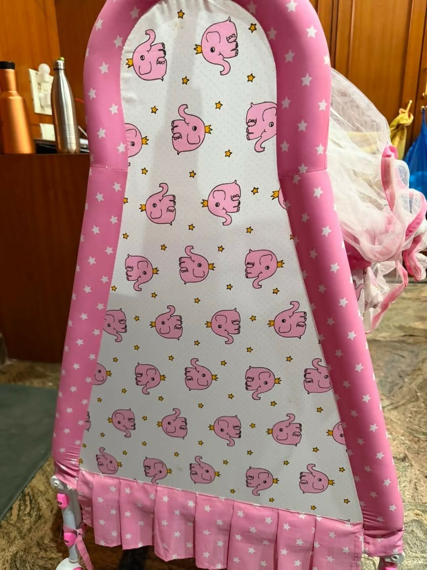 Fab N Funky Manual Cradle with a sturdy frame, gentle manual rocking motion, comfortable sleeping area, breathable design, and secure construction to provide a cozy resting space for newborns and infants.