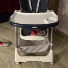STAR AND DAISY Galaxy Star High Chair with comfortable padded seat, adjustable feeding tray, safety harness, sturdy frame, footrest, and easy-clean design for convenient baby and toddler mealtimes.