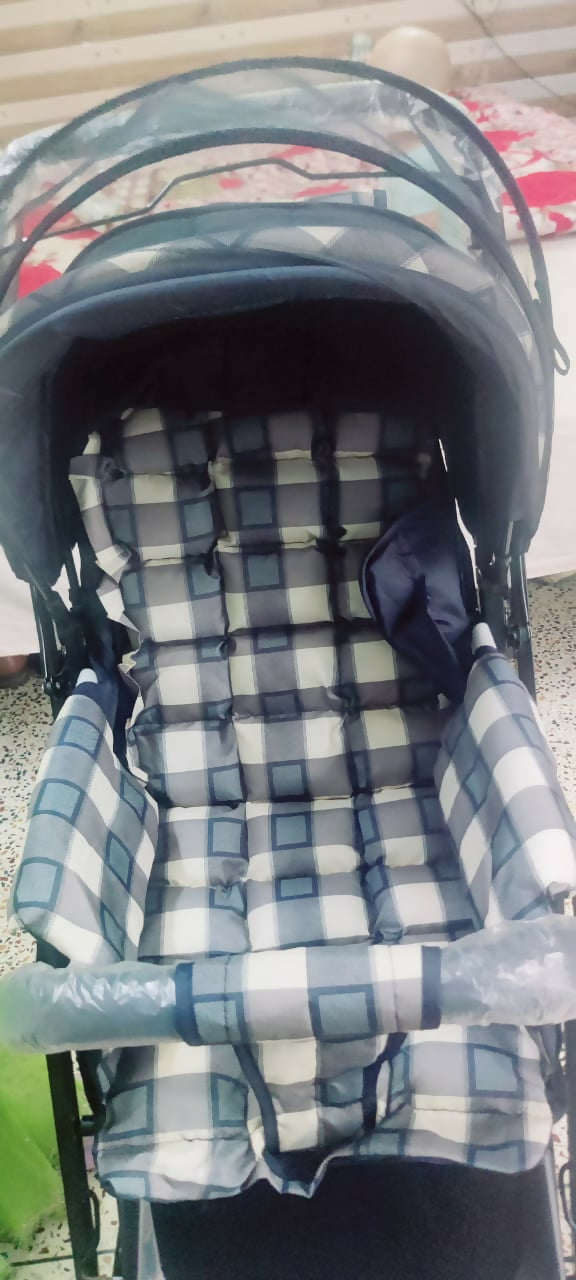 STAR AND DAISY Sigma stroller with reclining seat, smooth wheels, safety harness, adjustable canopy, and comfortable travel design for babies and toddlers.