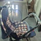 STAR AND DAISY Sunrise Baby Stroller with adjustable canopy, padded seat, and sturdy wheels in a modern design.