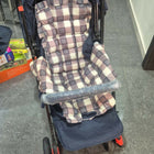 STAR AND DAISY Sunrise Baby Stroller with adjustable canopy, padded seat, and sturdy wheels in a modern design.