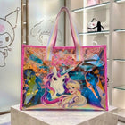 Holographic tote bag with a spacious interior, durable construction, comfortable carry handles, and a shimmering iridescent finish for shopping, travel, work, and everyday use.