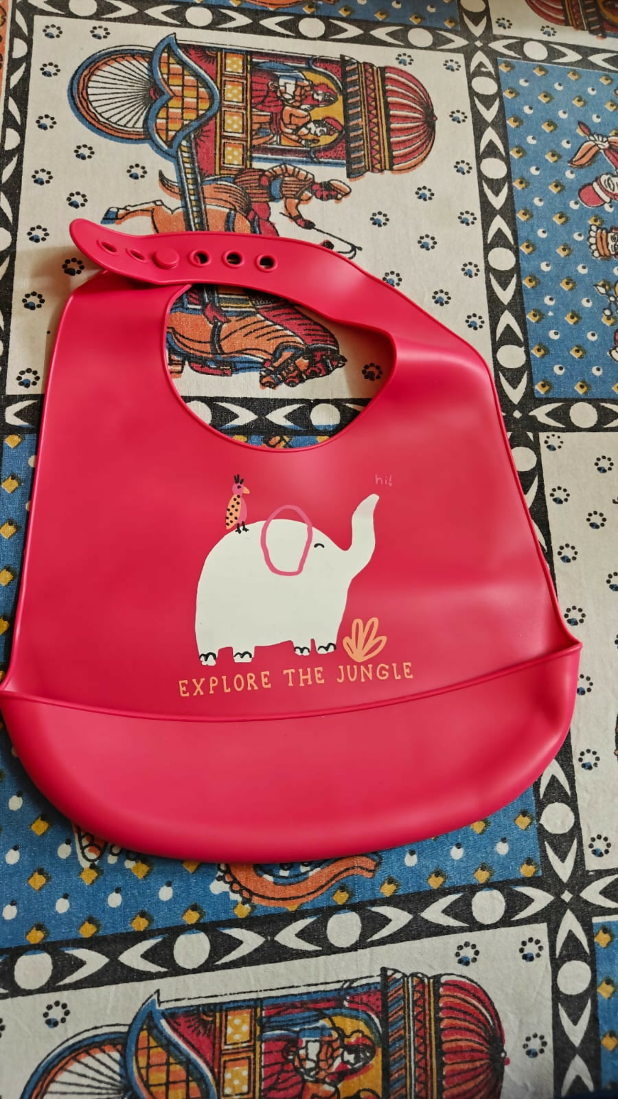 silicone baby bib made from food-grade BPA-free silicone with an adjustable neck strap, deep spill-catching pocket, and soft waterproof design for mess-free mealtimes.