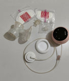 LUVLAP Adore single electric breast pump with adjustable suction settings, compact design, milk collection bottle, and comfortable pumping support for breastfeeding mothers.