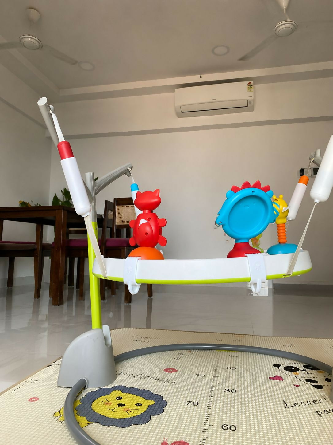 SKIP HOP Jumpscape Baby Activity Center in Almost New condition featuring an engaging play setup with interactive activities, supportive seating, and a child-friendly design for supervised play and exploration.