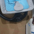 Electric swing and rocker for babies with gentle soothing motion, cushioned seat, secure harness, calming design, and comfortable support for rest and relaxation.