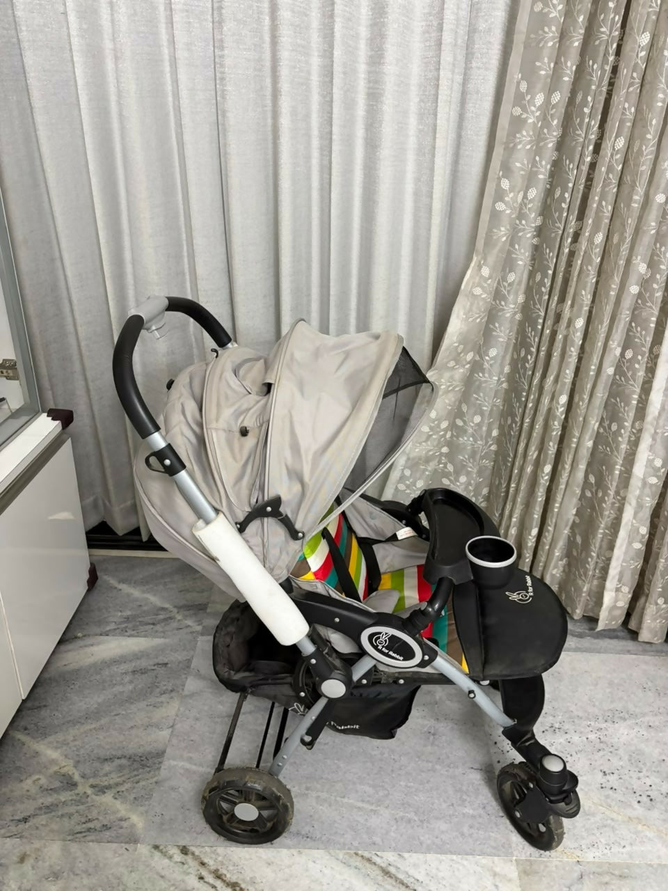R FOR RABBIT Chocolate Ride Baby Stroller/Pram in Some Used condition, available in Ahmedabad, featuring comfortable seating, reclining backrest, protective canopy, safety harness, smooth wheels, and foldable design.