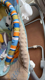 INFANTSO baby rocker and bouncer with a comfortable cushioned seat, gentle rocking motion, secure safety harness, and sturdy frame for soothing, relaxing, and playtime.