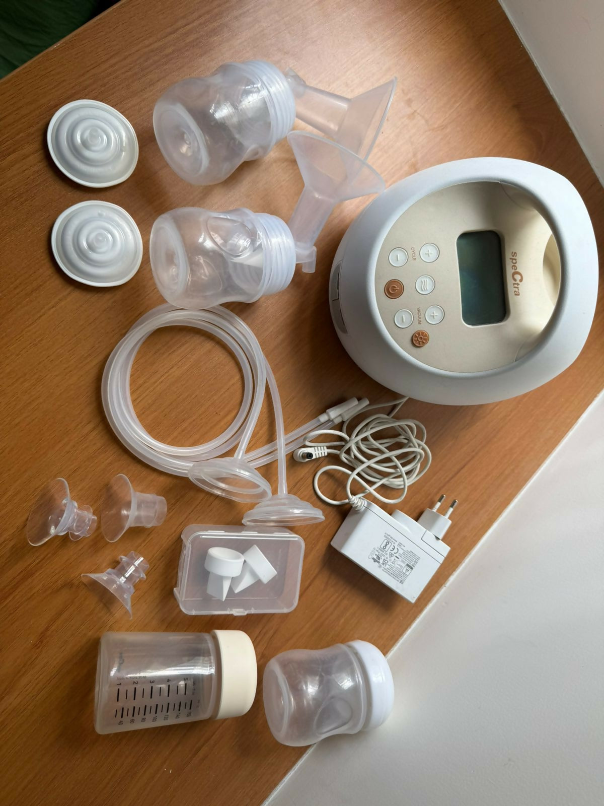 SPECTRA S2 Pro Wearable Breast Pump with 2 Phase Pumping in Almost New condition, featuring a compact hands-free design and convenient pumping modes for comfortable and flexible breast milk expression.