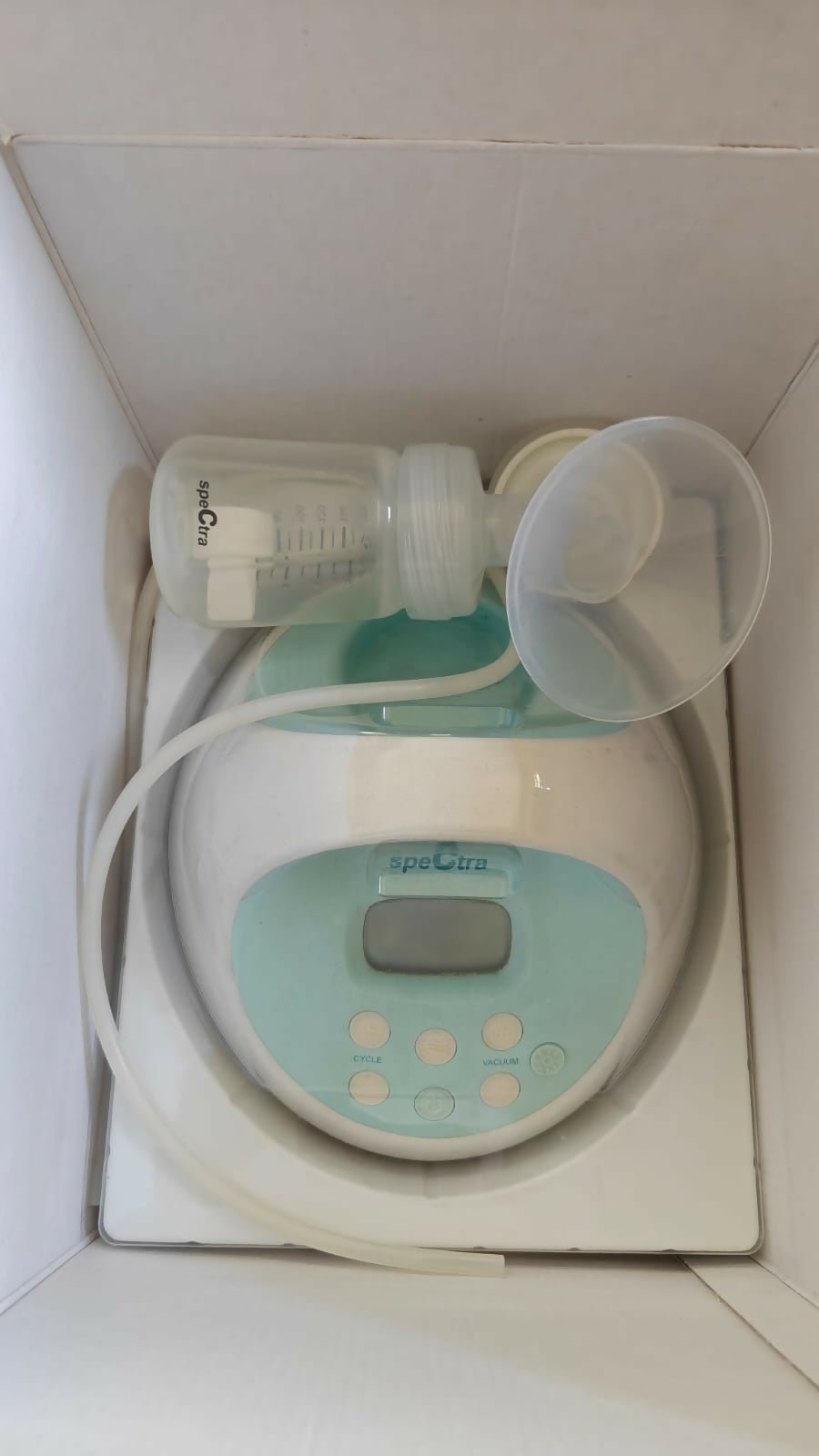 SPECTRA S-1 Plus Electric Breast Pump in White & Sky Blue with adjustable suction levels, massage mode, rechargeable battery, closed-system hygiene, and quiet operation for comfortable milk expression.