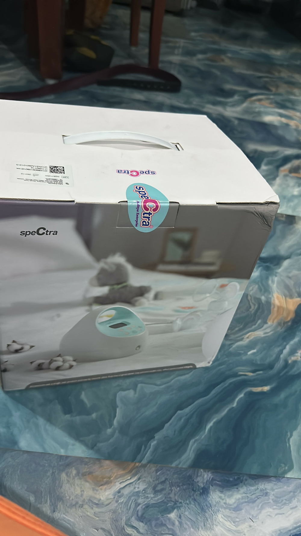 SPECTRA S1+ Rechargeable Electric Breast Pump with adjustable suction settings and portable design.