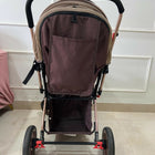 StarAndDaisy foldable baby stroller travel pram with reclining seat, sturdy wheels, safety harness, adjustable canopy, and compact foldable design for comfortable baby travel.