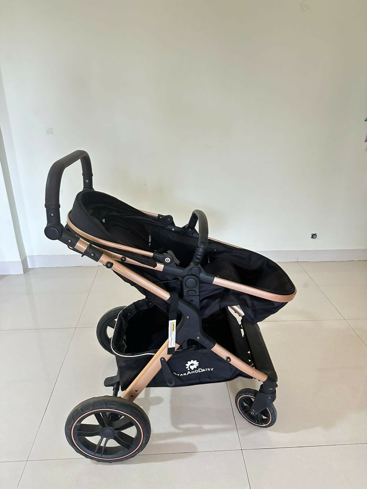 StarAndDaisy EasyGo travel-friendly luxury baby stroller pram buggy with reclining seat, smooth wheels, safety harness, adjustable canopy, and compact design for comfortable baby travel.