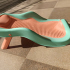 Star and Daisy Baby Bath Seat in Orange-Green, designed for babies 0–1 year with an upgraded supportive design and anti-slip base for comfortable, convenient supervised bathing.