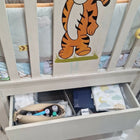 Wooden baby crib with storage, mattress, and bumper featuring sturdy wooden construction, spacious sleeping area, built-in storage, protective bumpers, and comfortable support for babies.