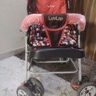 LUVLAP Sunshine Baby Stroller/Pram in Almost New condition featuring comfortable seating, reclining backrest, protective canopy, safety harness, smooth wheels, and a convenient design for everyday walks, shopping, travel, and outing