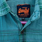 SUPERDRY Boys Shirt in Some Used condition, available in Delhi, featuring a stylish casual design, comfortable fit, and versatile look for everyday wear, outings, parties, and casual occasions.