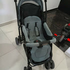 Babyhug Symphony stroller with reclining seat, smooth wheels, safety harness, adjustable canopy, and comfortable travel design for babies and toddlers.
