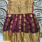 Traditional outfit with gold and maroon fabric