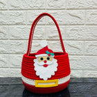 Red woven basket with a Santa Claus face 