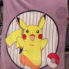 Blanket with Pikachu design on a purple background