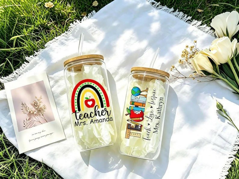 Teacher's Day Special Personalized Glass Tumbler with custom teacher name or message, reusable steel straw, secure lid, and stylish transparent design for everyday drinks and thoughtful teacher gifting.