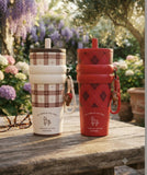 Insulated Tumbler (700 ml) with double-wall stainless steel insulation, spill-resistant lid, reusable straw, ergonomic design, and large capacity to keep beverages hot or cold for hours.