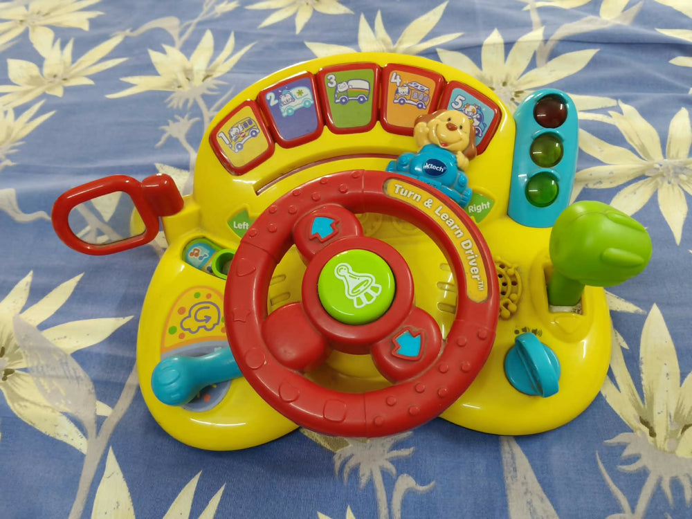 VTECH Turn & Learn Driver Multicolour interactive driving toy for kids.