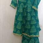 Make a style statement with our Beautiful Green Color Peplum Top and Garara Set, offering elegance and sophistication for festive occasions and parties.