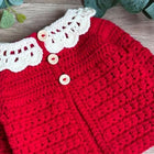 Soft and cozy Sweater, Cap, and Booties Set for babies, offering warmth, comfort, and style for colder days.